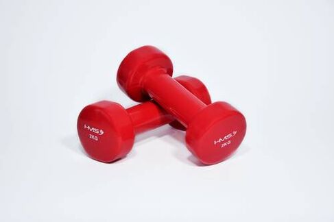 Basic exercises for breast augmentation are done with dumbbells